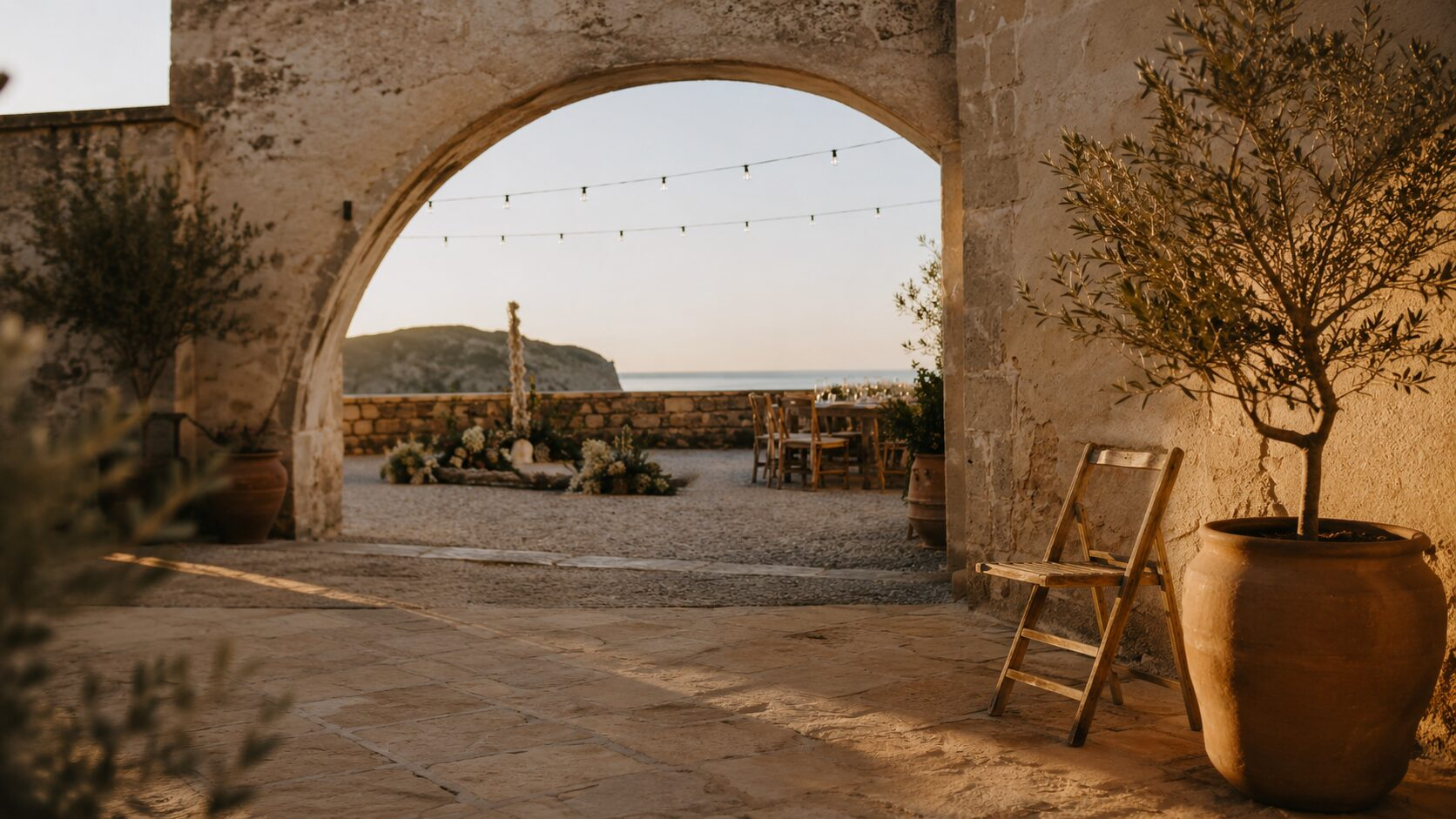 Empty stone courtyard wedding venue at golden hour, Costa Blanca North, Spain